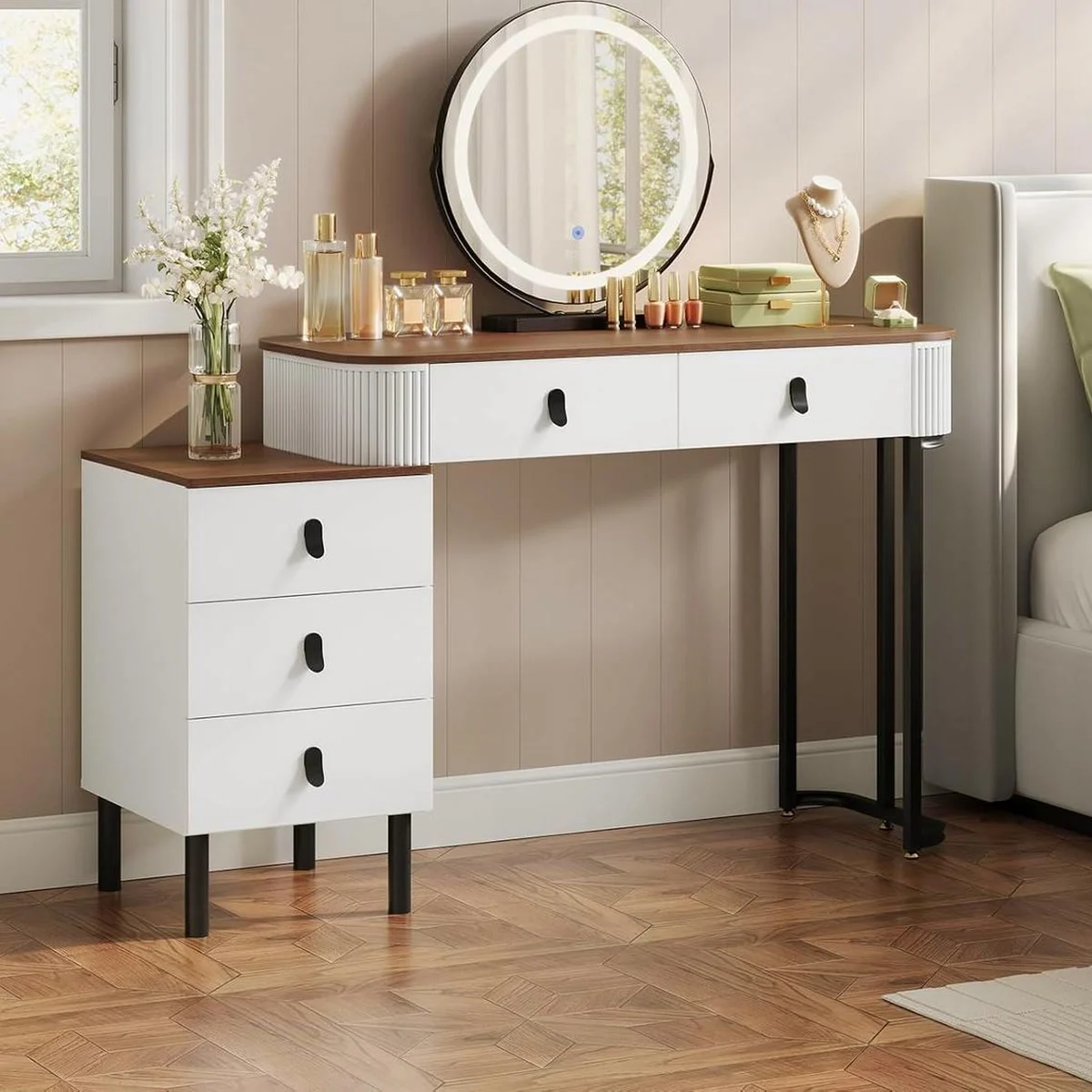 The dressing table next to a bed, drawer unit on the left