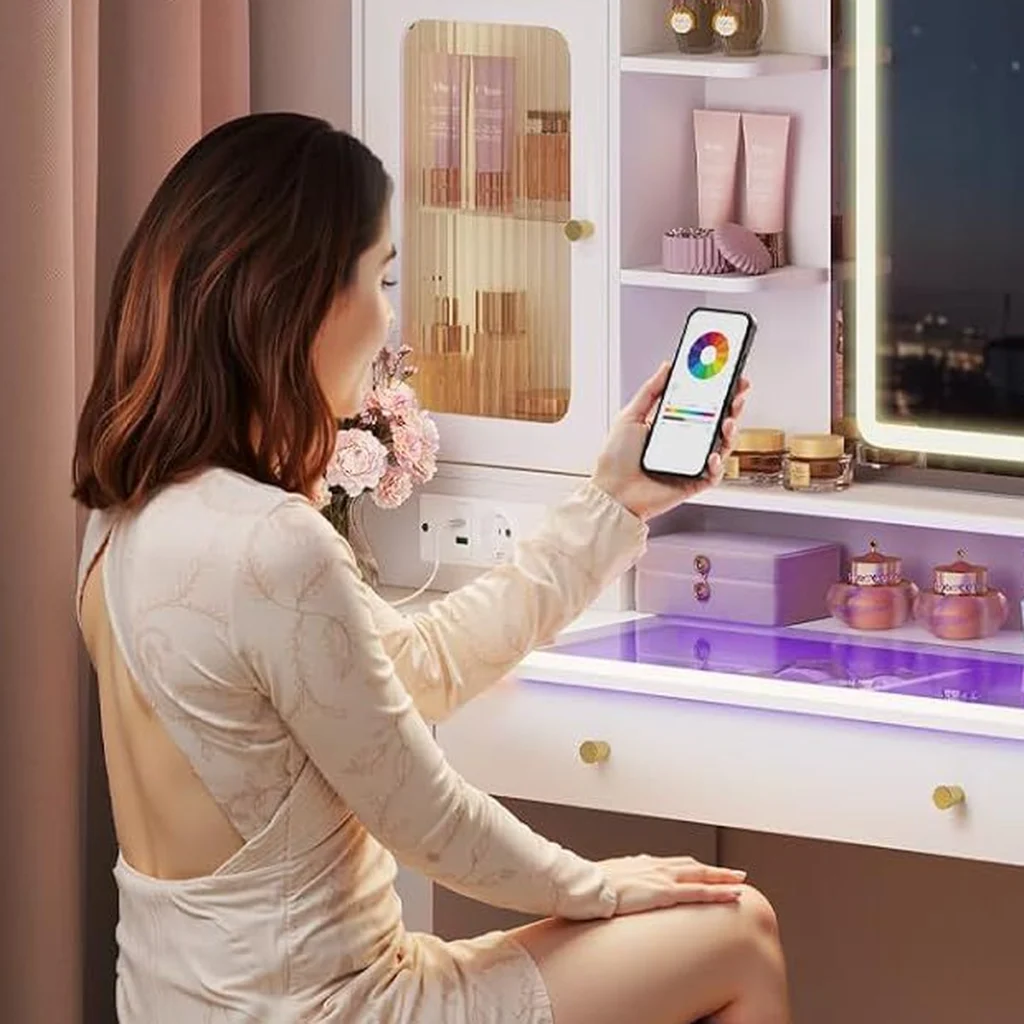 A woman adjusting the lighting from her phone