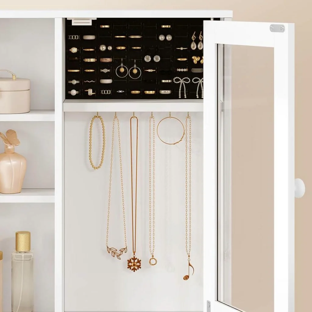 The jewellery box open: rings and earrings at the top, necklaces on 6 gold hooks