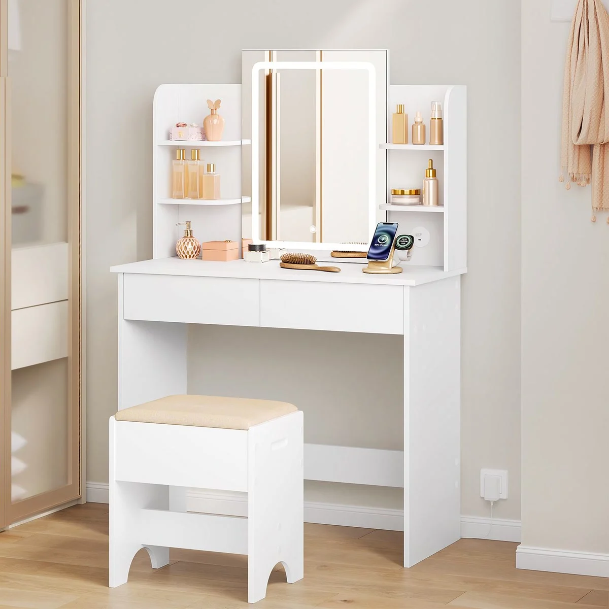 White 90 cm dressing table in a bedroom, with the LED mirror switched on