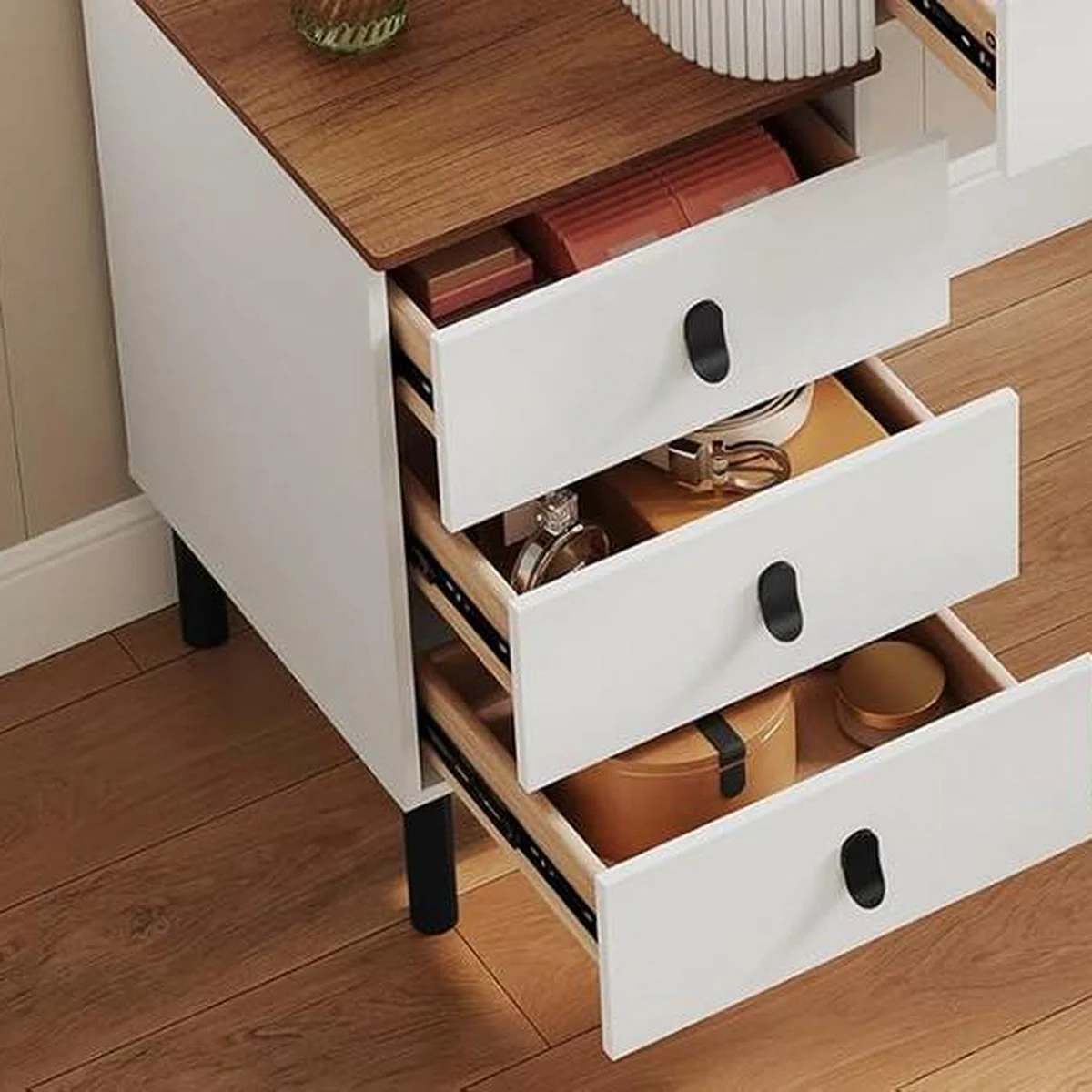 The 3 drawers of the drawer unit open