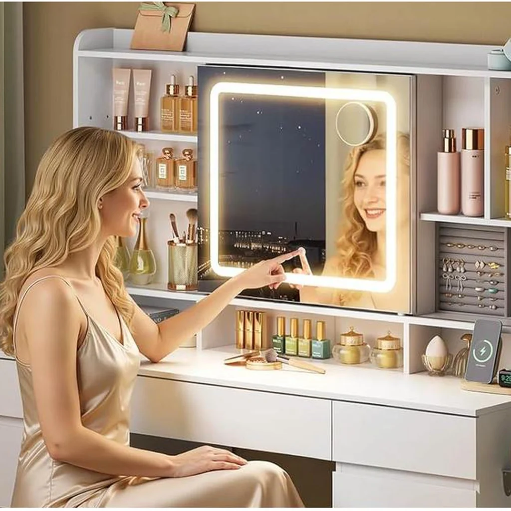 A woman switches on the LED mirror with a tap