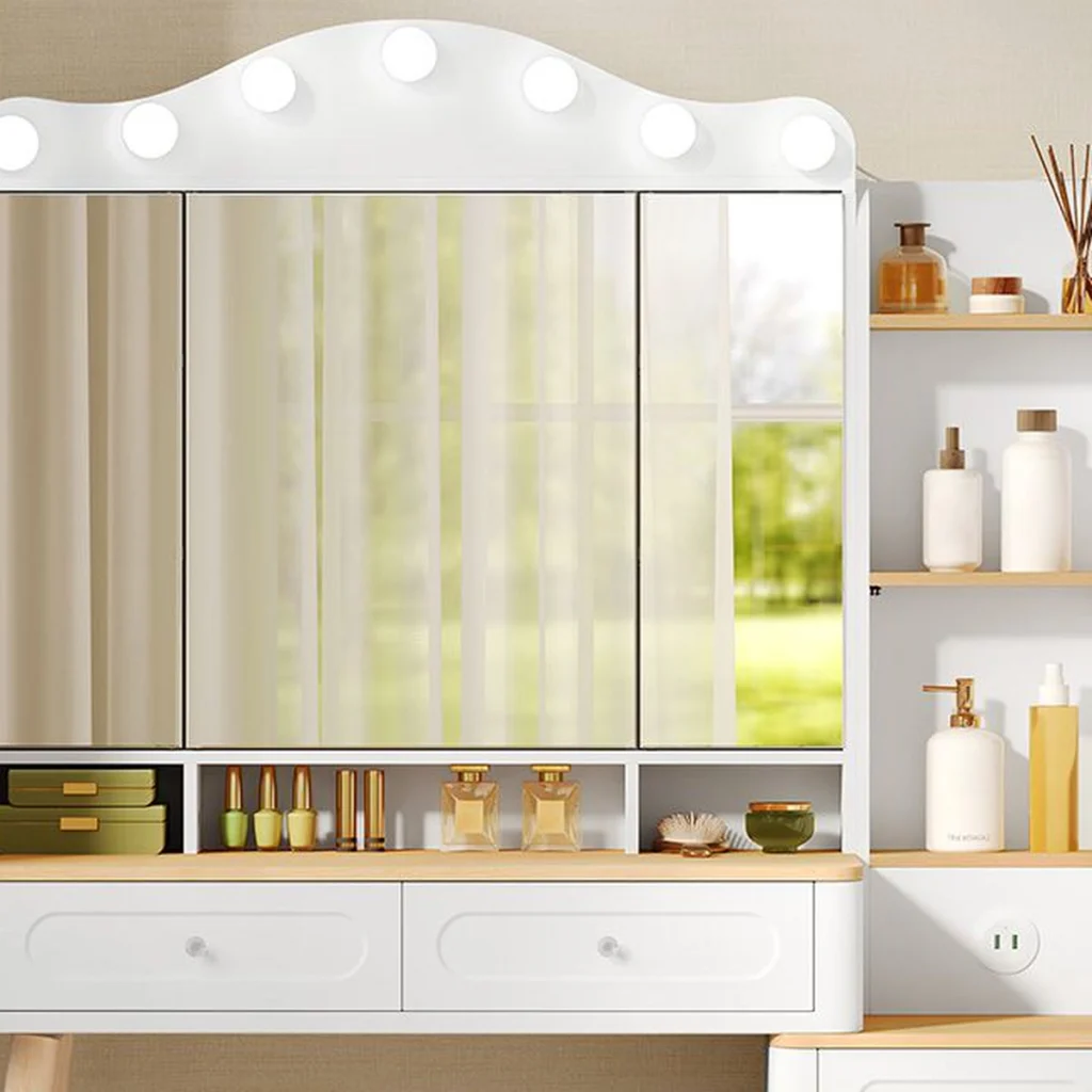 The LED bulbs lit above the tri-fold mirror