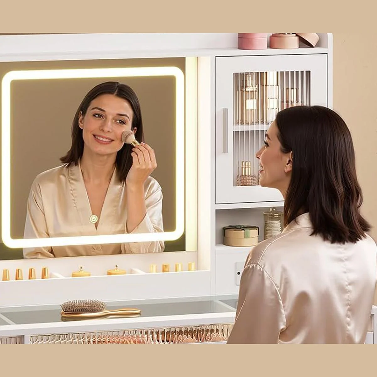 A woman doing her make-up in front of the lit LED mirror
