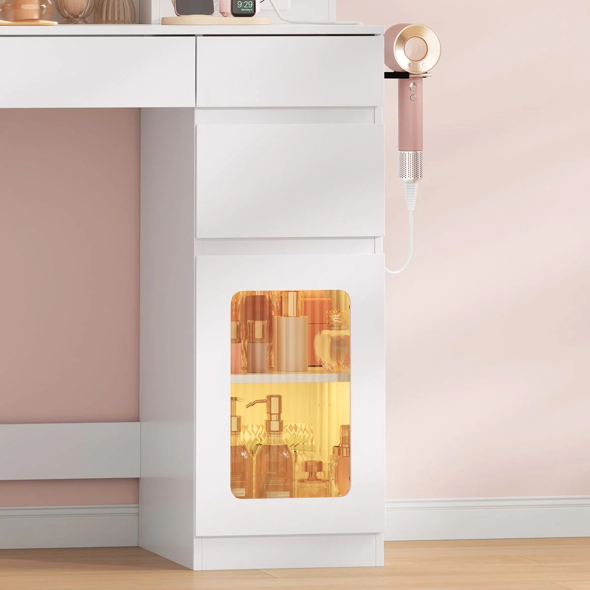 A cupboard with its lit acrylic door, and the hair dryer holder