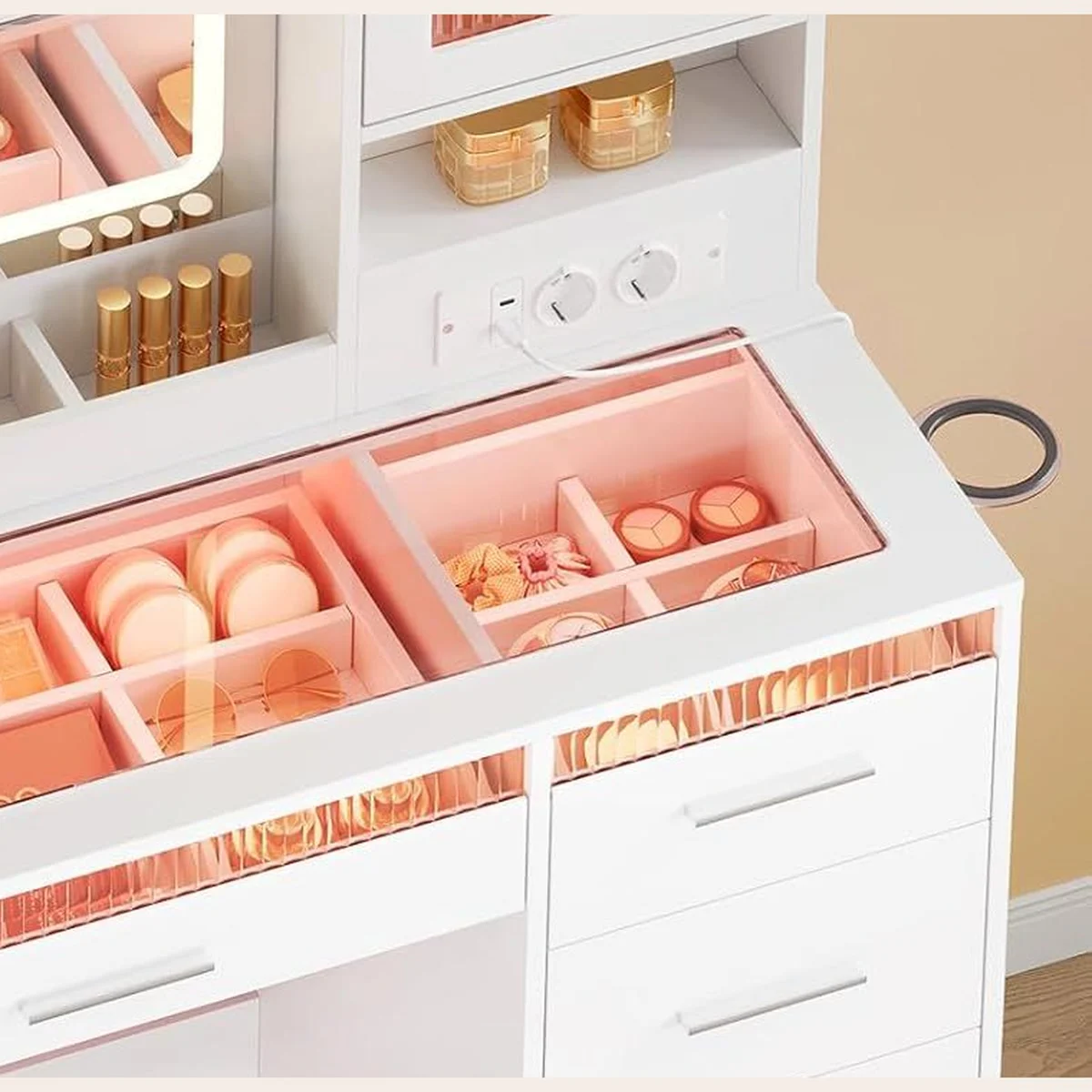 Jewellery and palettes stored under the glass top