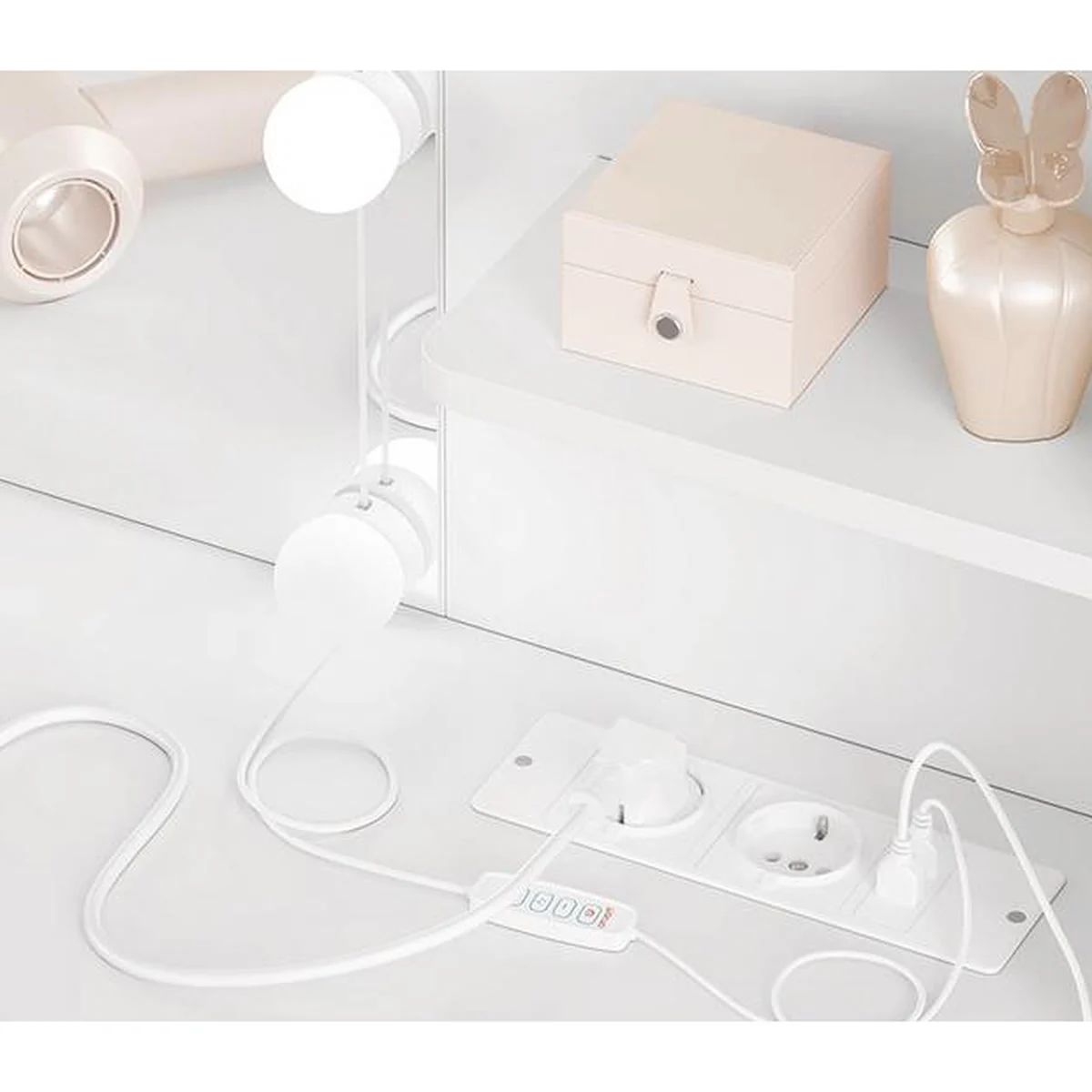 The power strip on the top: 2 power sockets and 2 USB ports