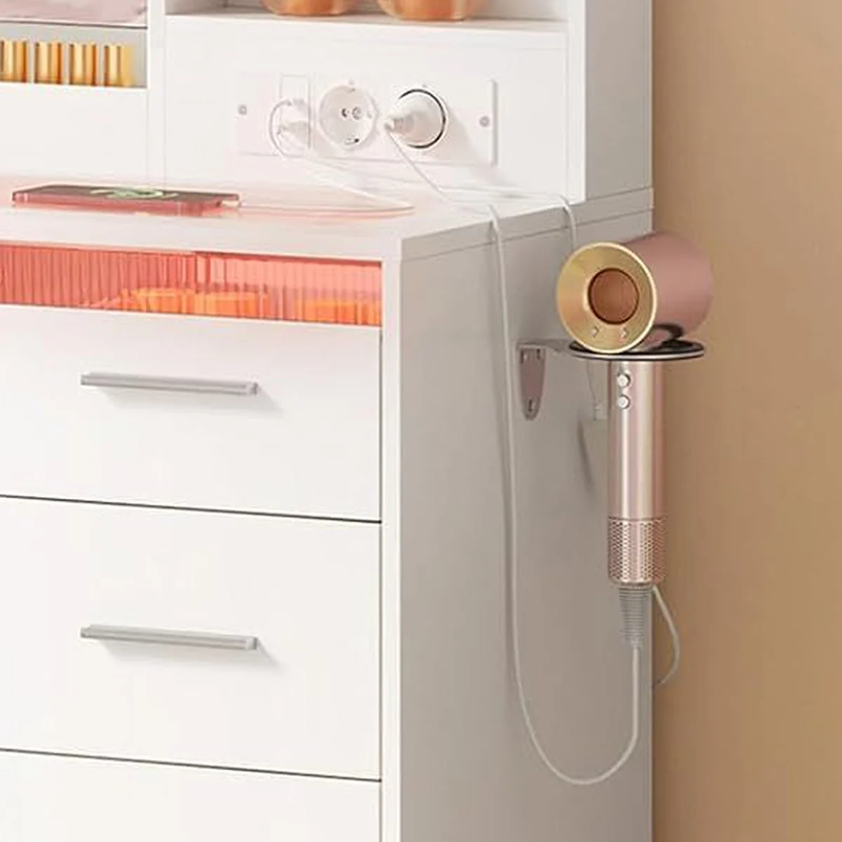 The 2 sockets and the USB ports above the tabletop, and the hair dryer in its holder