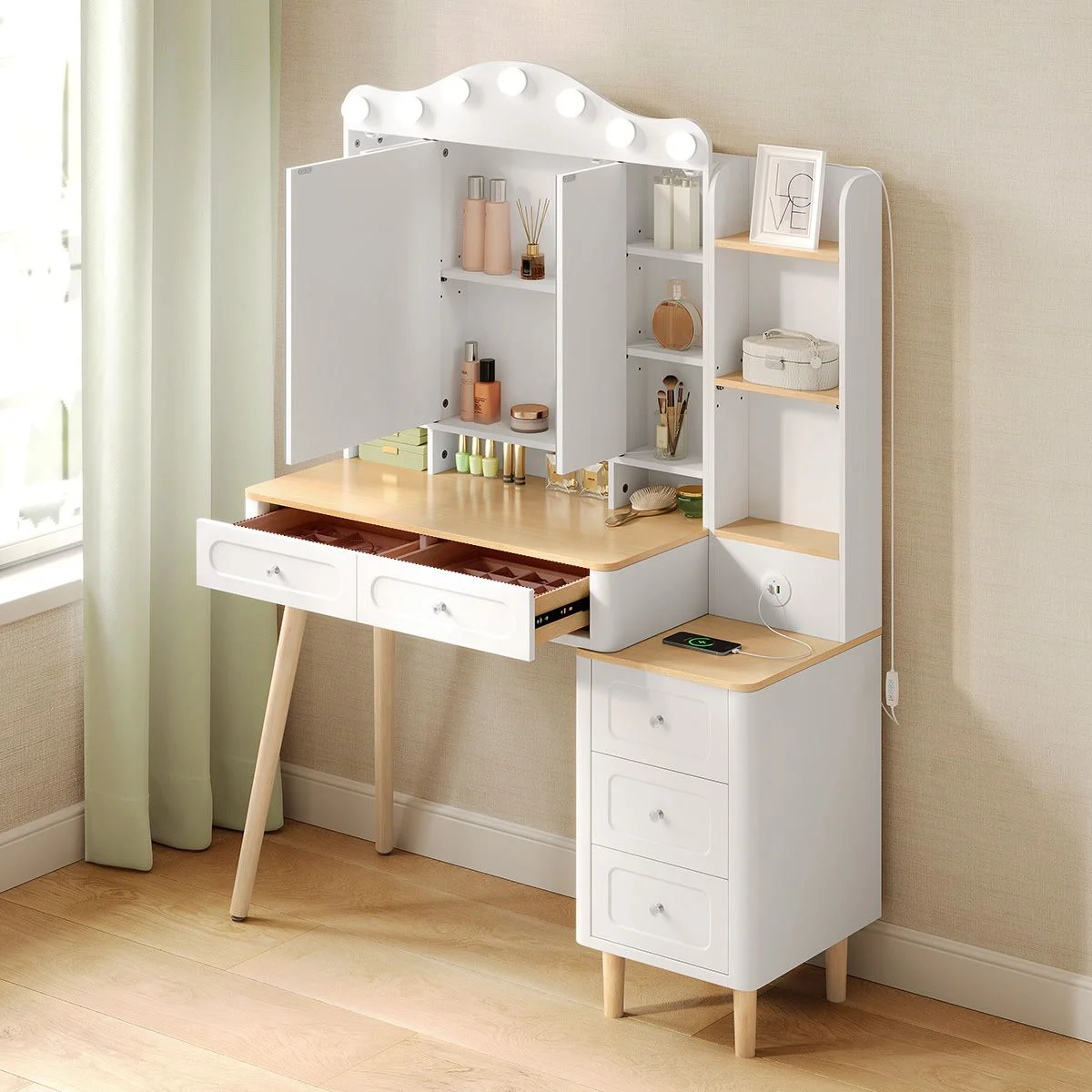 The mirror panels open onto the hidden storage, with a drawer open