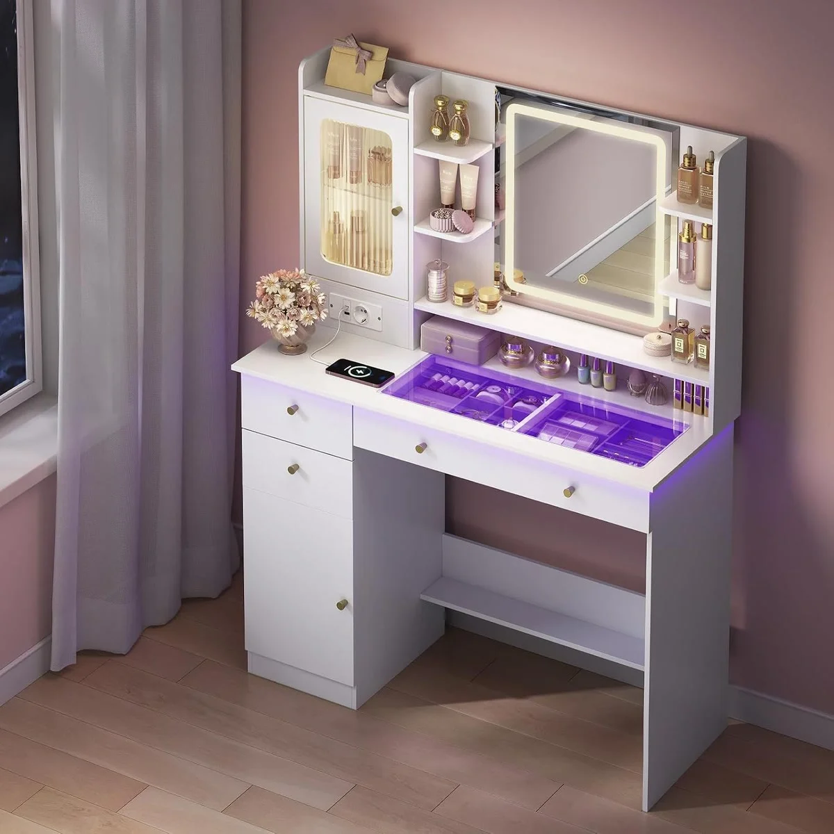 The glass top lit in purple, with the jewellery storage underneath