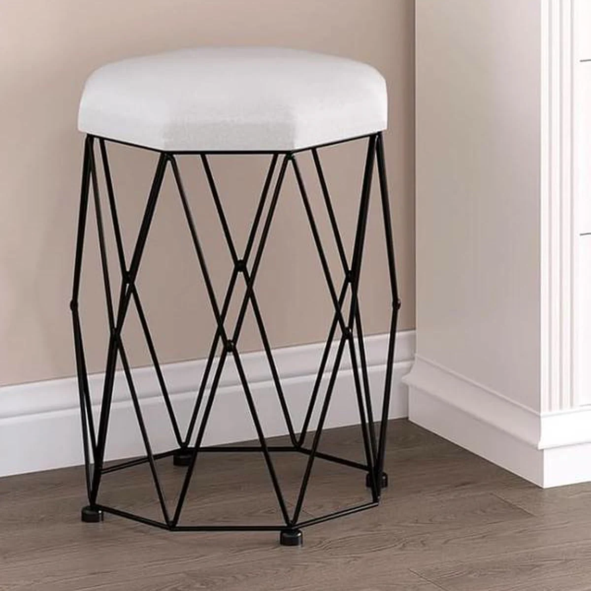 The white velvet stool with black legs