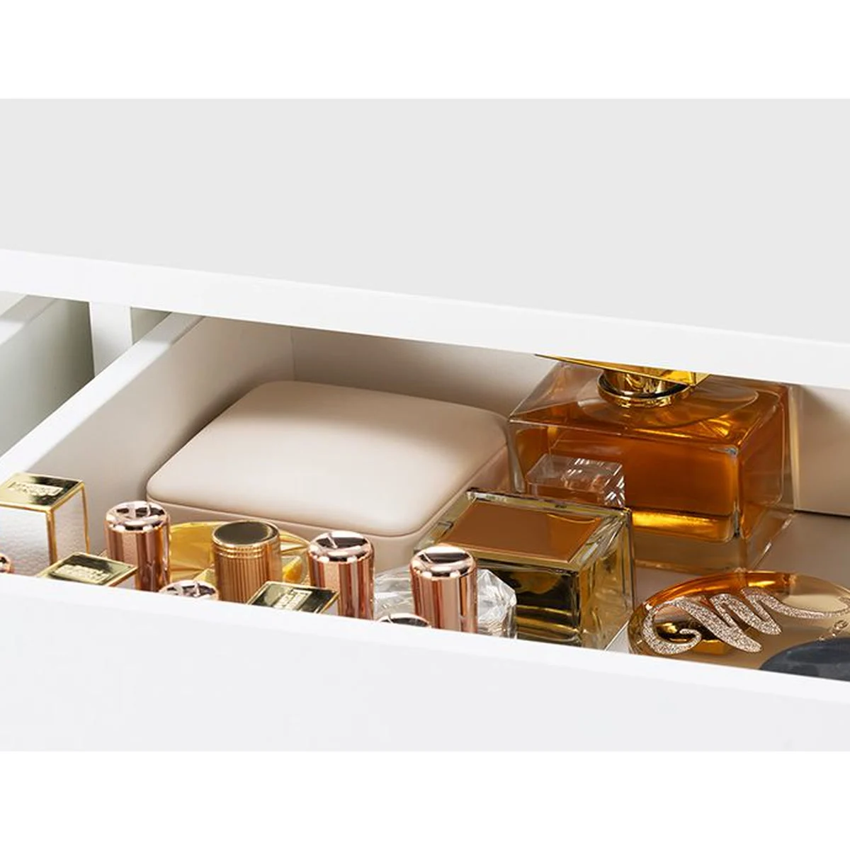 An open drawer full of beauty products
