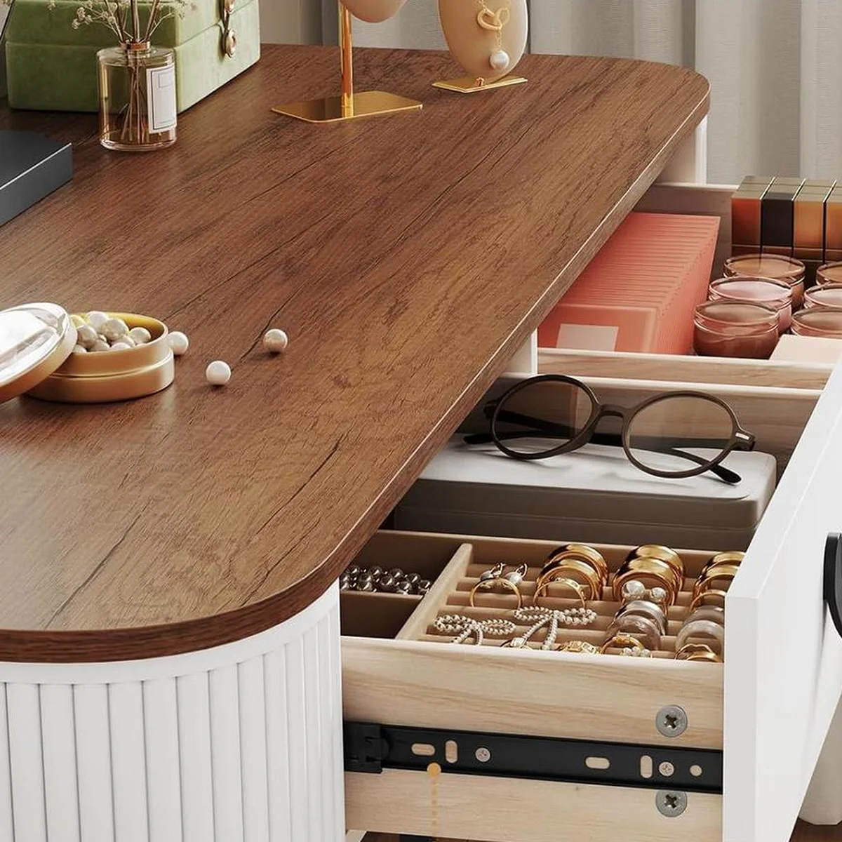 The solid wood drawers open, under the walnut-effect top